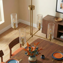 Load image into Gallery viewer, Enigma - 4 Lights Chandelier With Clear Ribbed Satin - Antique Brass / Clear / Gold