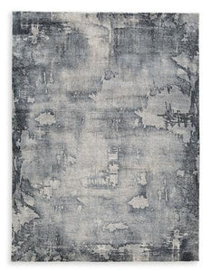 Langrich 7'10" x 10'6" Rug - Ego Home Furniture