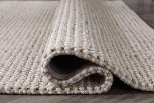 Jossick 7'8" x 10' Rug - Ego Home Furniture